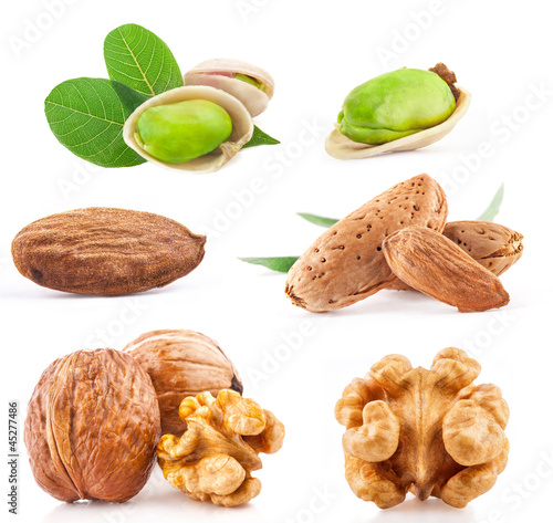 Walnut, Almond and Pistachio nuts isolated on white background