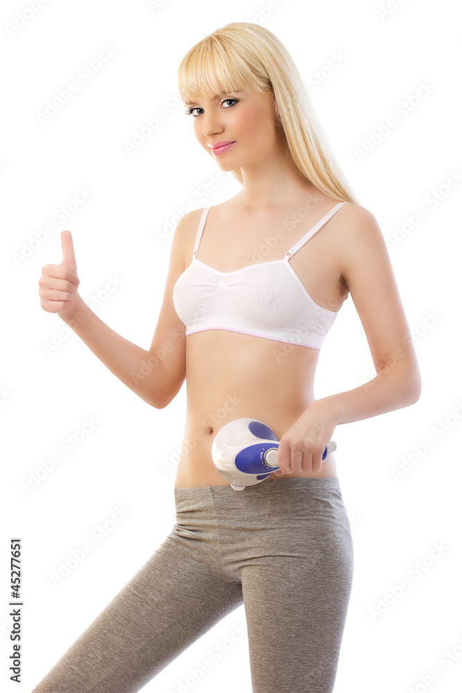 Pretty woman holding massager and giving thumbs up Pretty woman holding massager and giving thumbs up