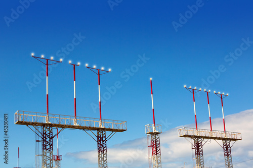 Landing lights towers in white and red