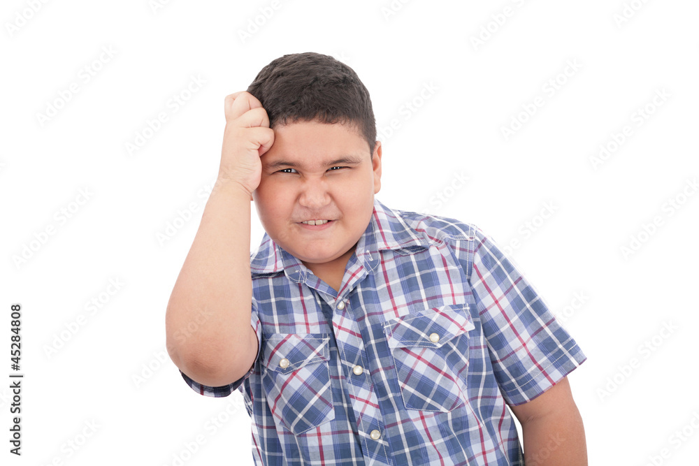 Adorable boy upset isolated over white background Adorable boy upset isolated over white background