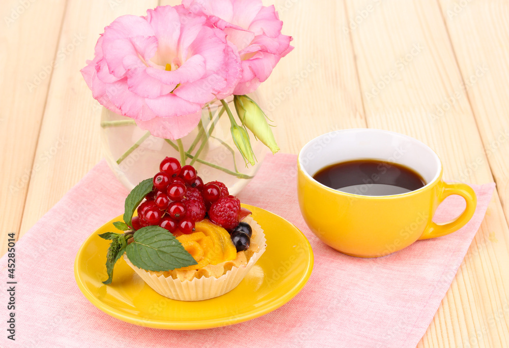 Dulcet cake with fruit and berries on wooden table Dulcet cake with fruit and berries on wooden table