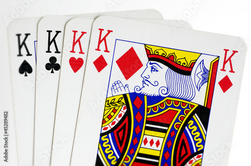 Four kings playing cards photo