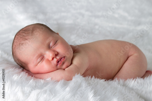 Newborn baby peacefully sleeping