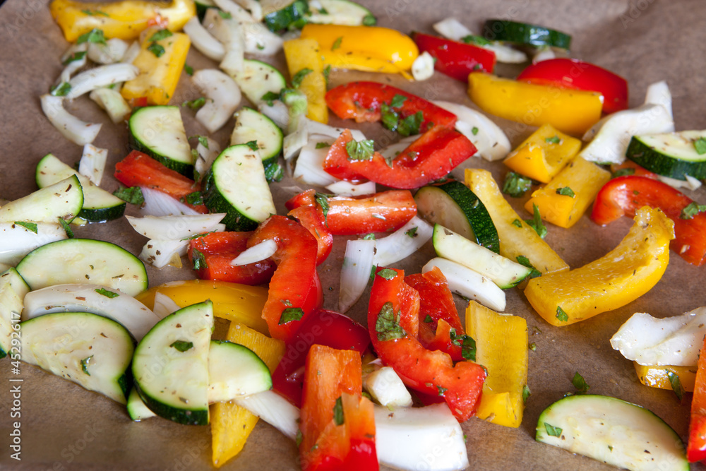 Colorful vegetables with oliv oil on oven tray