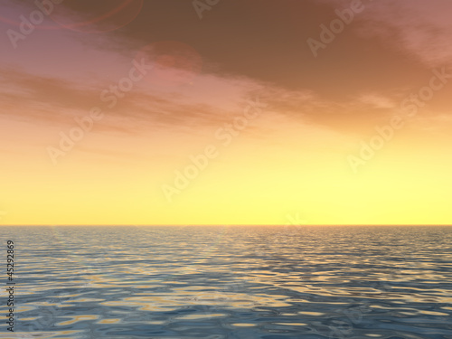 Conceptual sunset background with sun close to horizon