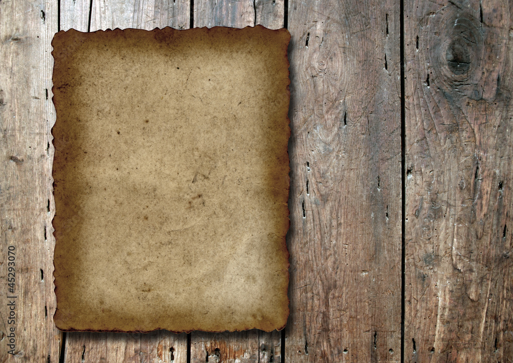 Old paper over an old wood background Old paper over an old wood background