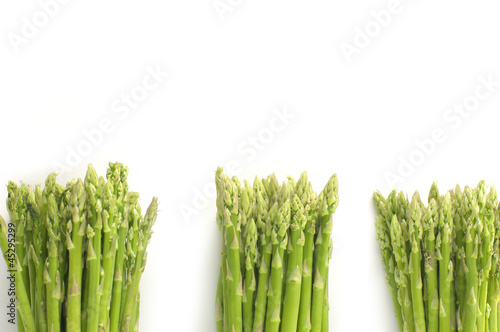green asparagus isolated on white