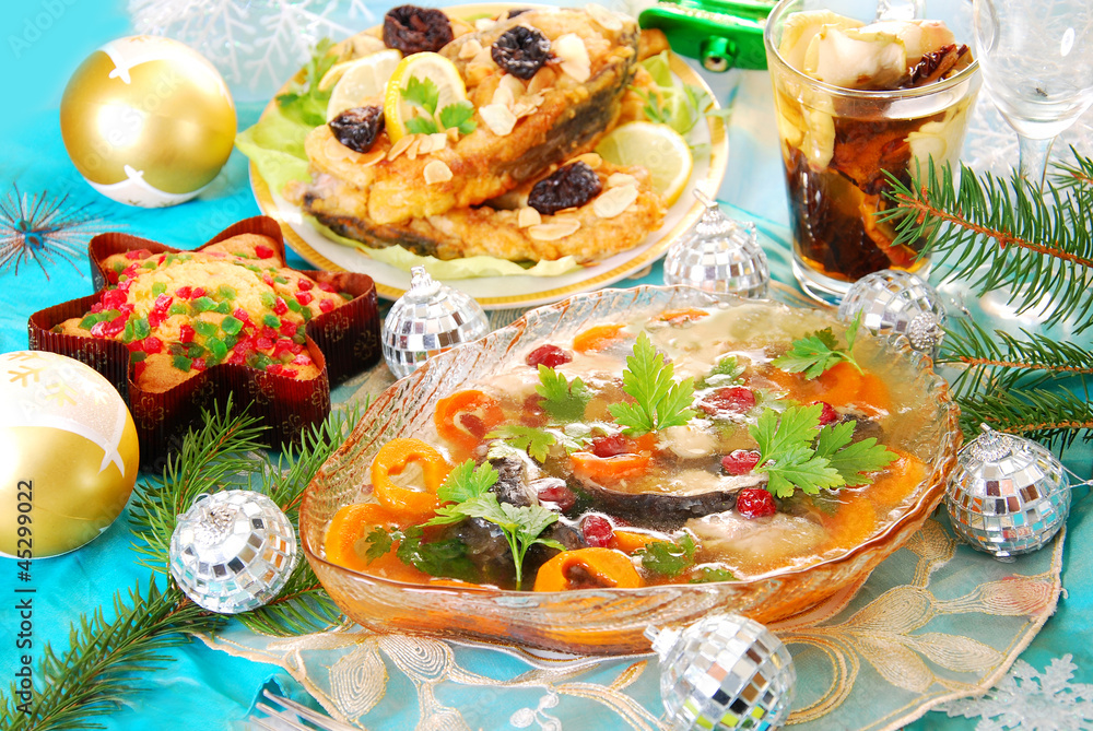 Fototapeta premium carp in jelly with carrot and cranberry for christmas