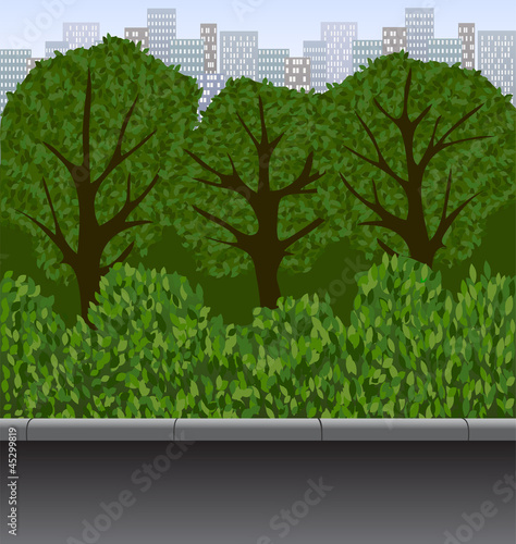 urban landscape with trees, bushes and walkway