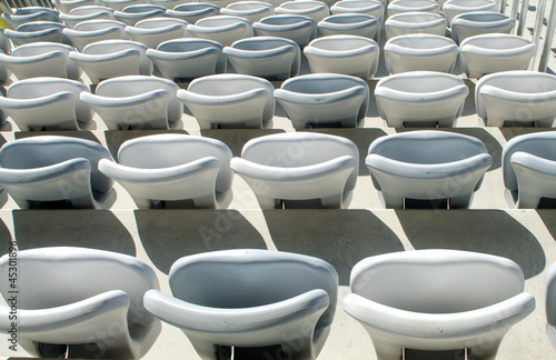 Gray plastic stadium seats