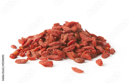 Pile of dry goji berries isolated on white background photo