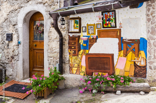 Cibiana, the village of murals, Alps, Italy photo