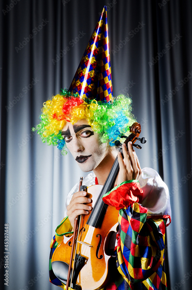 Clown playing on the violin Clown playing on the violin