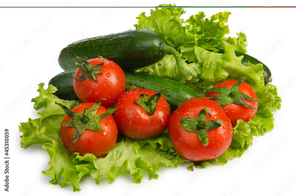 Cucumbers and tomatoes ready for salad Cucumbers and tomatoes ready for salad