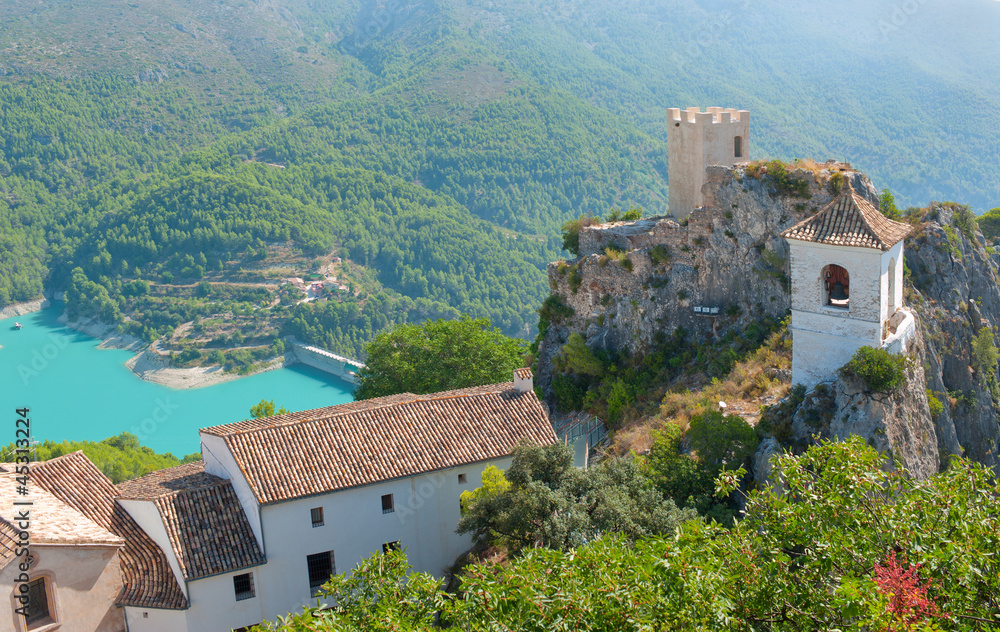 Obraz premium Bell tower, castle, Guadalest village, Alicante, Spain