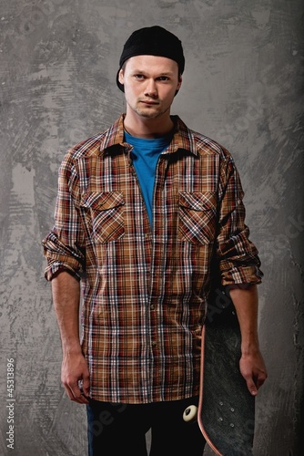 Young man with a skateboard