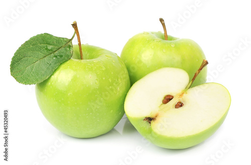 Ripe apples and cut apples