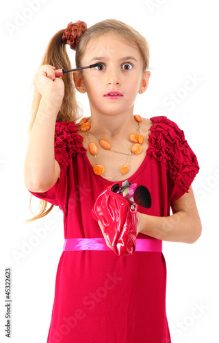 little girl in her mother's...