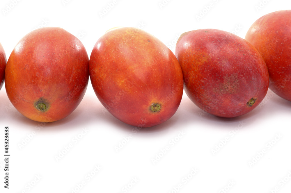 A row of fresh juicy mango