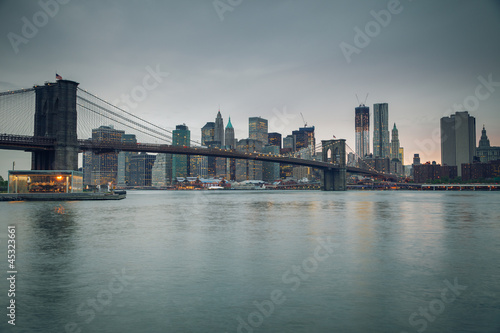 Brooklyn bridge and Manhattan at dusk © sborisov