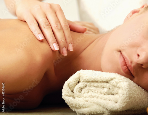An attractive woman getting spa treatment