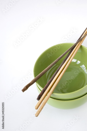 chopstick on green bowl