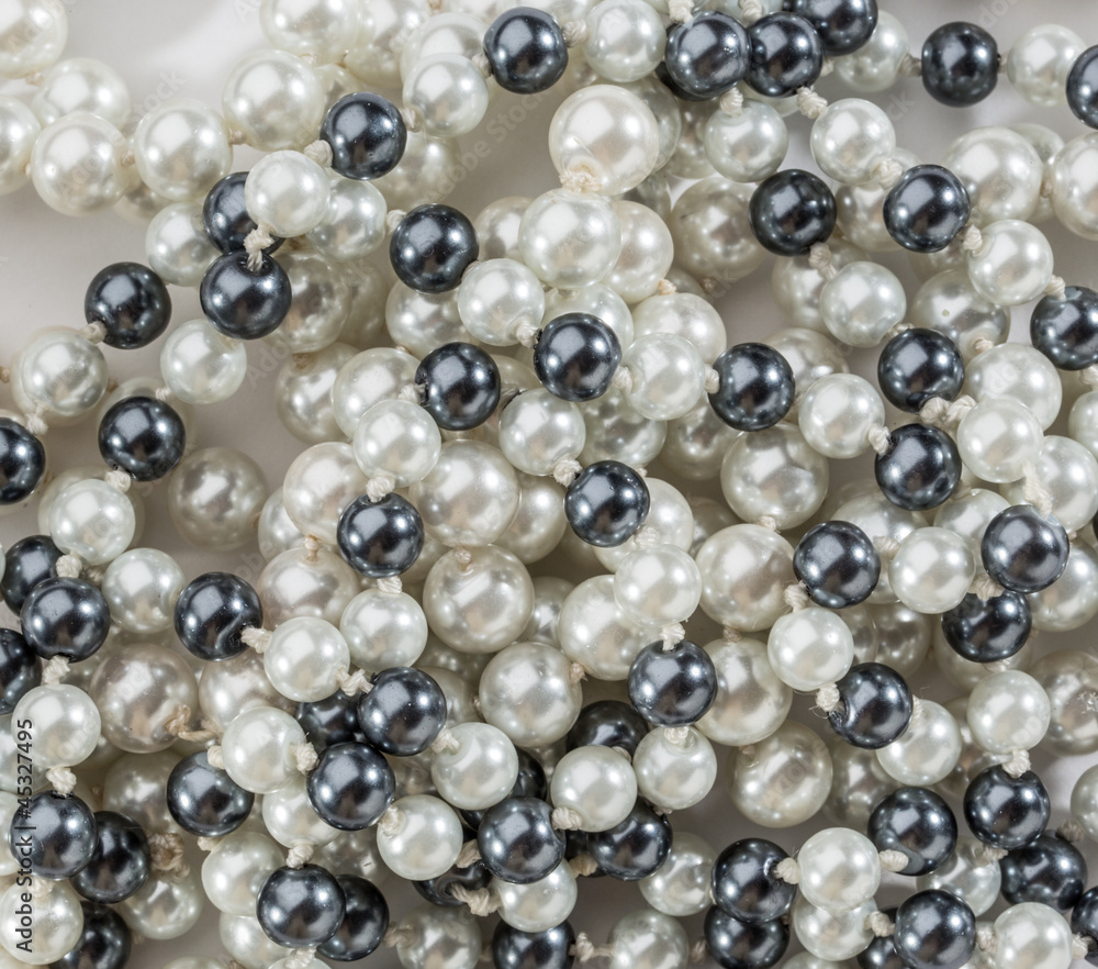 String of black and white pearls