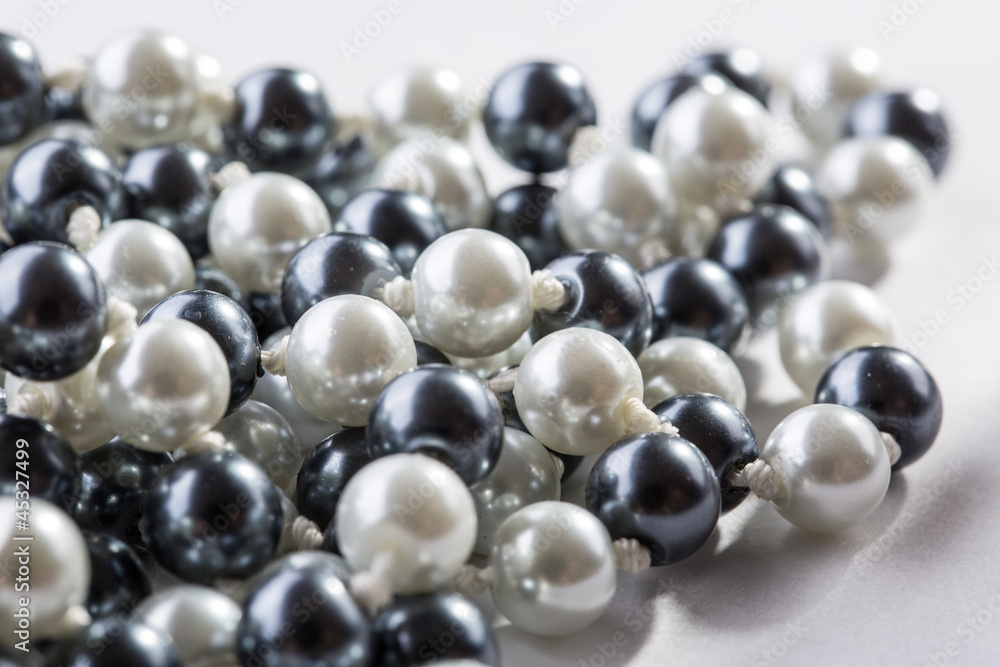 String of black and white pearls String of black and white pearls
