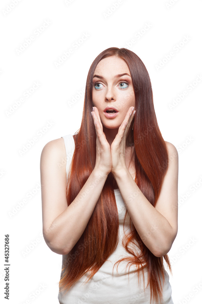 Young casual surprised female on white Young casual surprised female on white