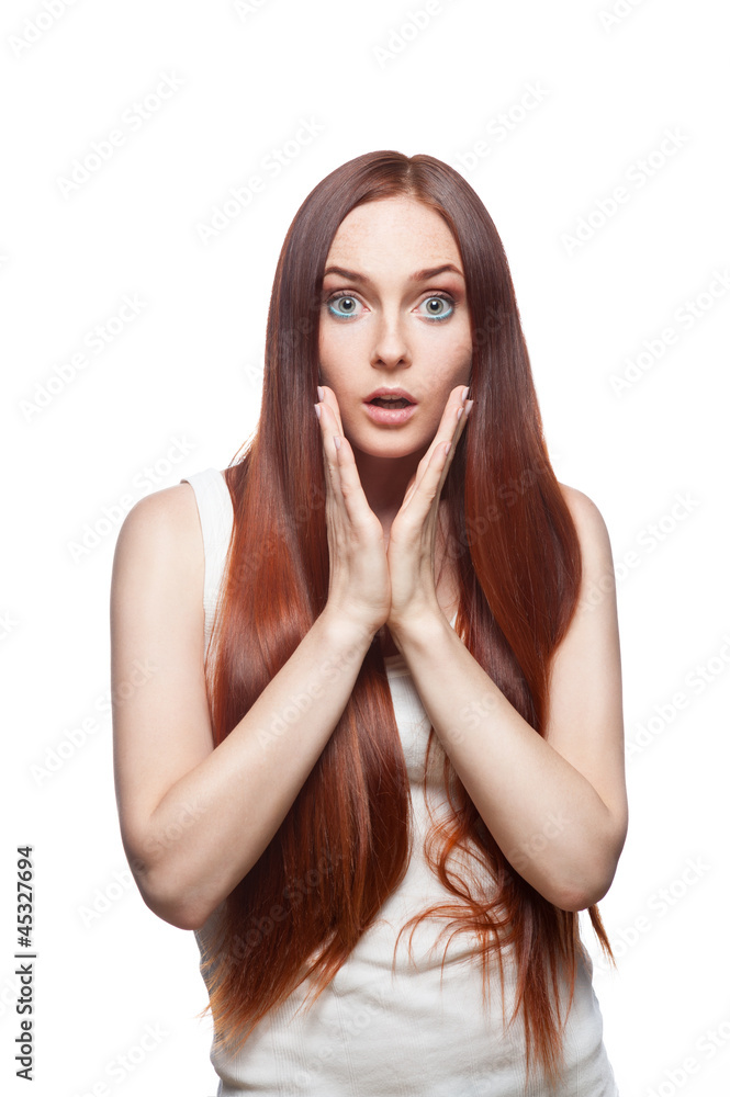 Young casual surprised female on white Young casual surprised female on white