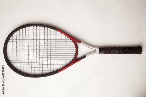 Tennisschläger auf weißem Hintergrund photo
