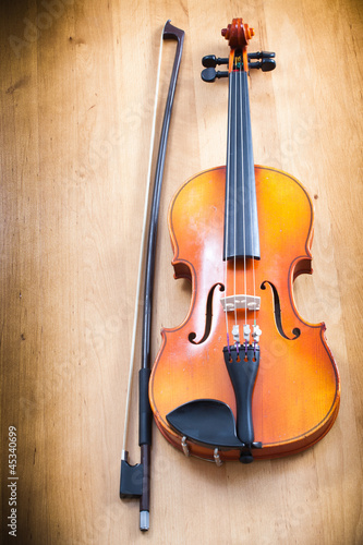 Violin on wooden background