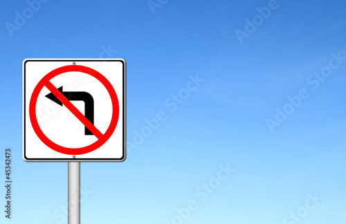 Road sign don't turn left over blue sky
