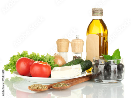 Ingredients for a Greek salad isolated on white background