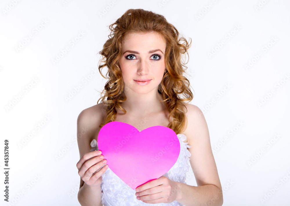 Portrait of happy bride in beautiful dress with paper heart Portrait of happy bride in beautiful dress with paper heart