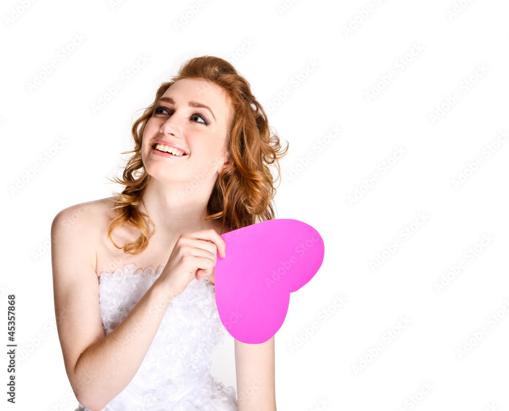 Portrait of happy bride in beautiful dress with paper heart Portrait of happy bride in beautiful dress with paper heart