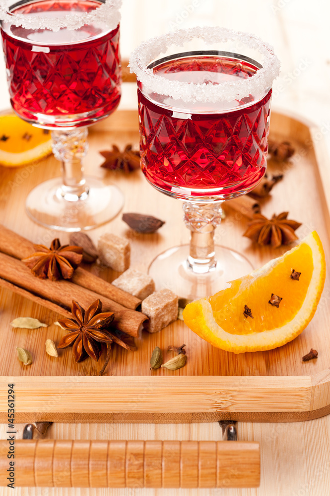 Two glasses of mulled wine and spices