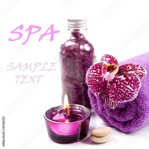 Spa concept   Orchid  candle   sea salt  and towel 