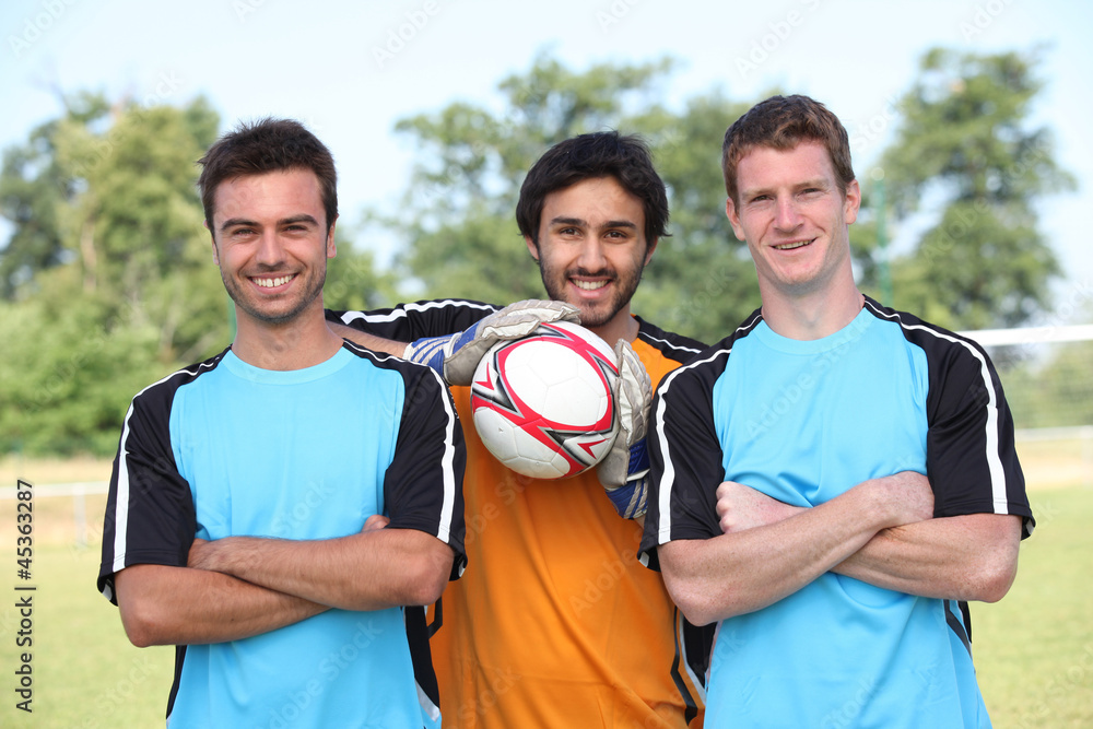 Football player pausing to have their picture taken Football player pausing to have their picture taken
