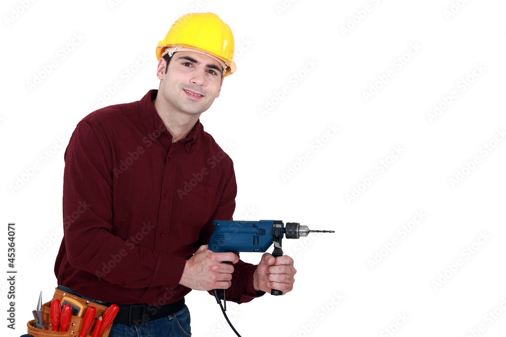 Man using power drill Man using power drill