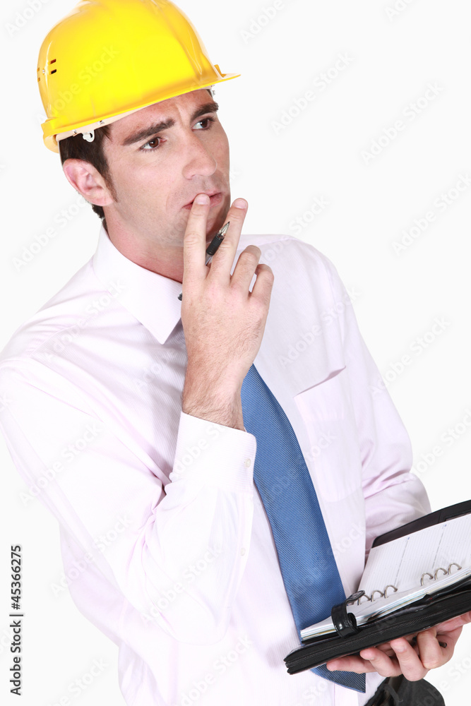 Architect thinking about days schedule Architect thinking about days schedule