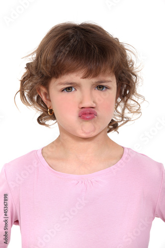 little girl pouting photo