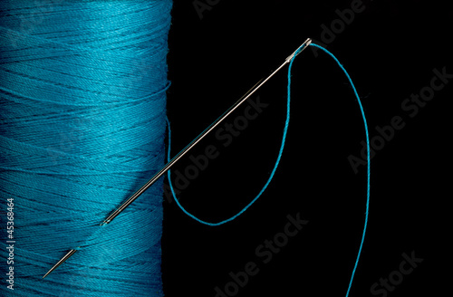 Blue thread with needle
