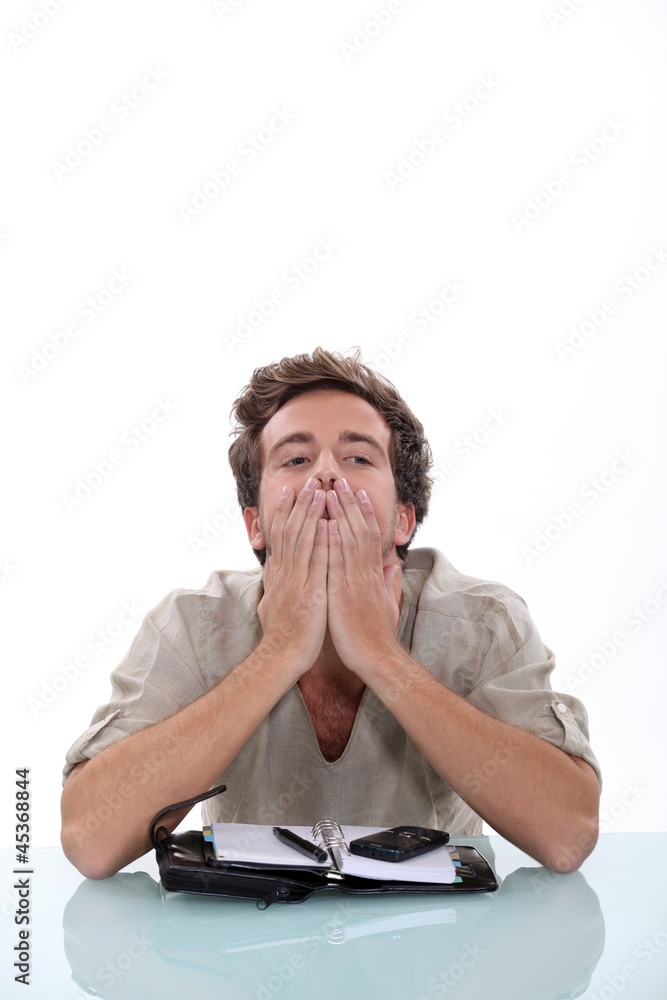 Man in a dilemma with his personal organizer Man in a dilemma with his personal organizer