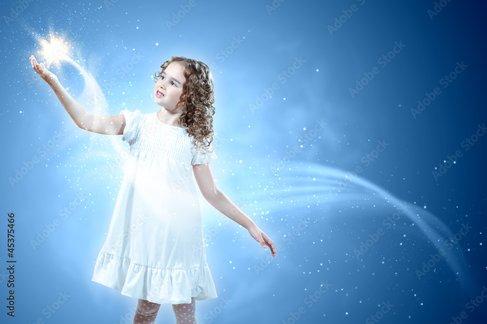 Child with magic light StockFoto Adobe Stock