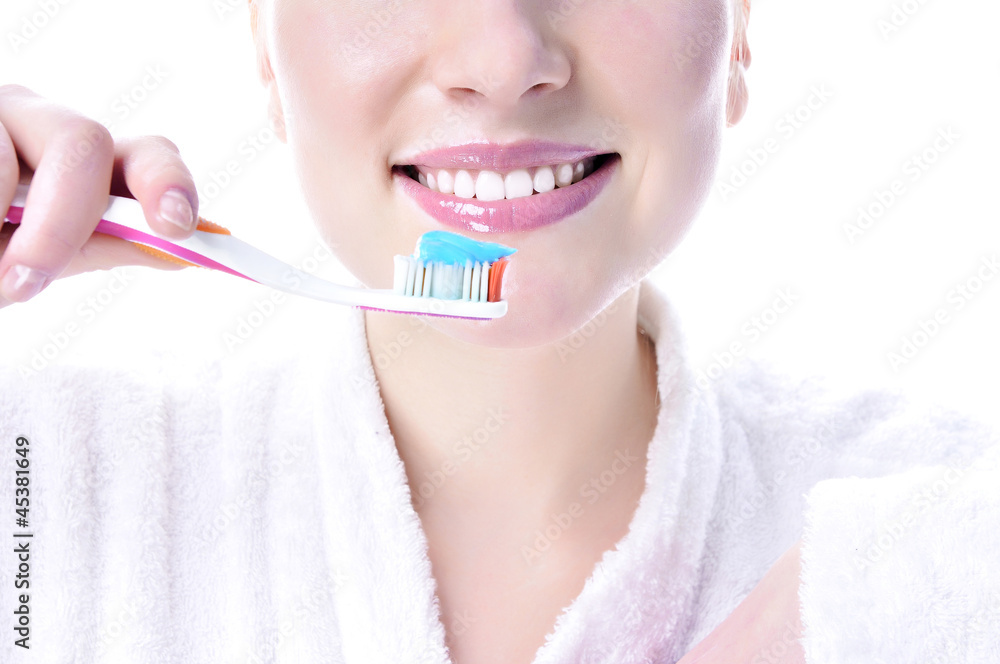 Girl Brushing her Teeth