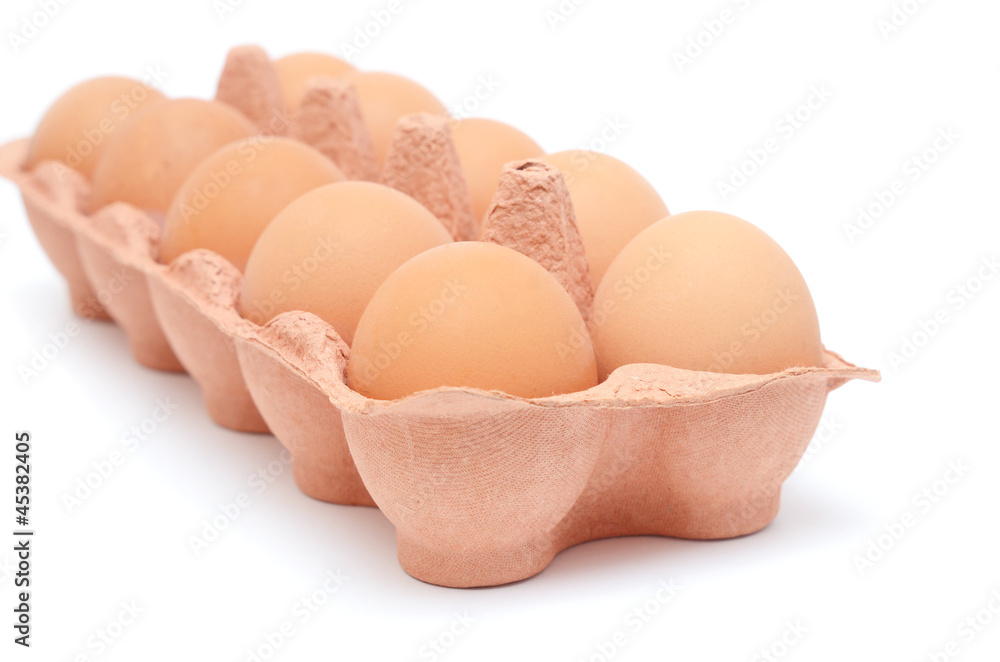 Eggs in paper box isolated on white Eggs in paper box isolated on white