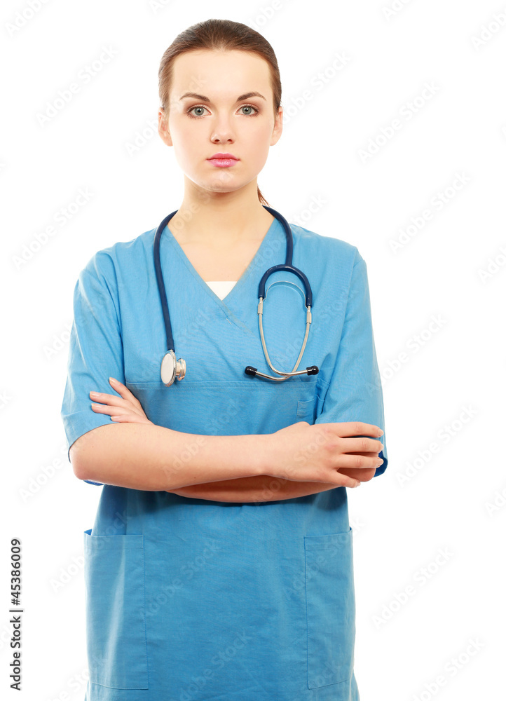 Happy young nurse standing with folded arms Happy young nurse standing with folded arms