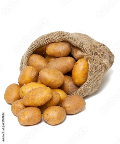 potatoes spilling from burlap bag