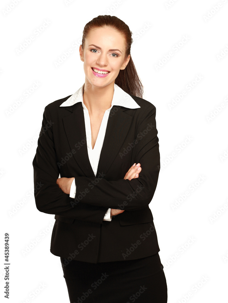 A beautiful woman standing with her arms crossed A beautiful woman standing with her arms crossed